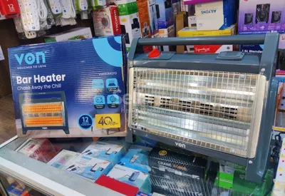 Von quartz bar room heater with humidifier 