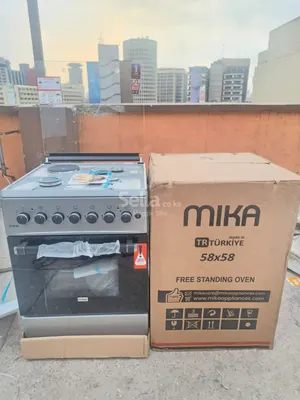 Silver Mika Standing Cooker 58 x 58 3 Gas + 1Electric Hotplate with Electric Oven